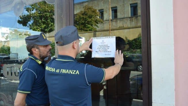 Pub owner reported hiding marijuana among bottles of alcohol.